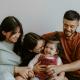 Whānau, parents with two daughters